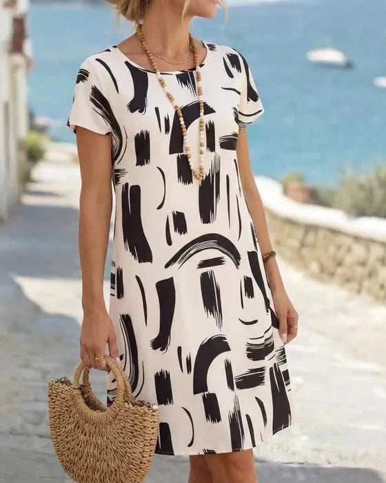 Kayla | Vestido de Manga Corta con Estampado Abstracto + Bolso de Regalo