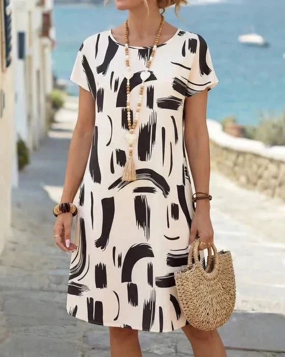 Kayla | Vestido de Manga Corta con Estampado Abstracto + Bolso de Regalo